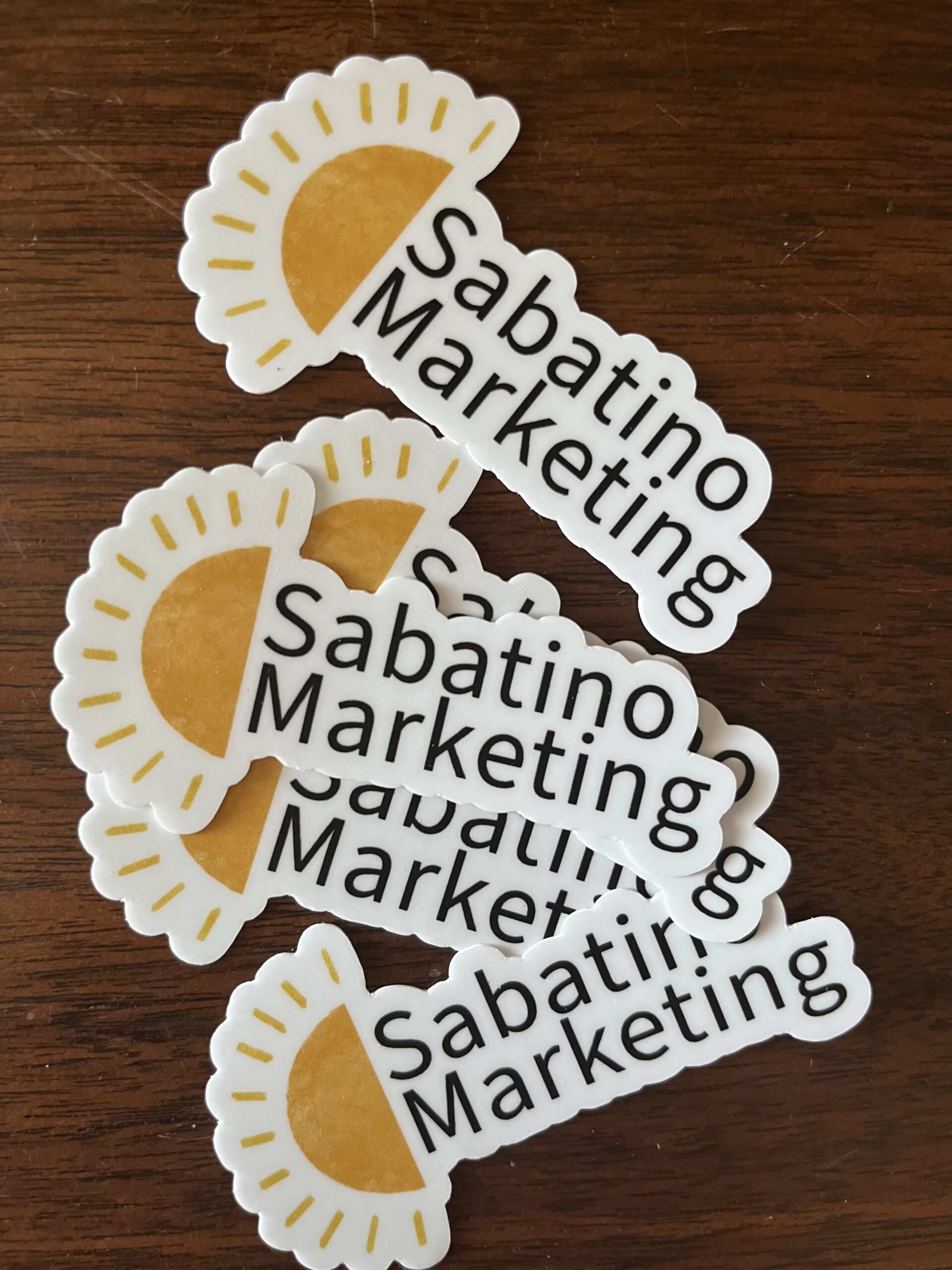 Stickers that say "Sabatino Marketing"