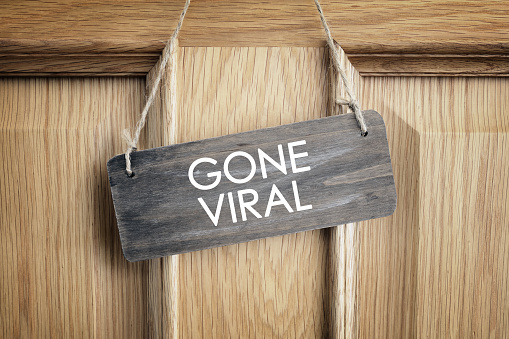 Gone Viral sign hanging on a door